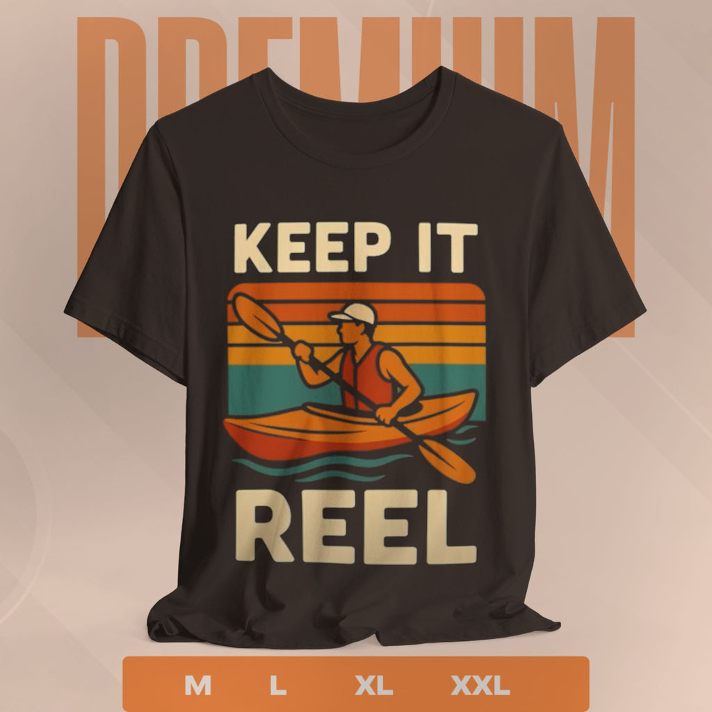 Marroon t-shirt with a graphic of a person in a kayak and 'Keep It Reel' text on a beige background.