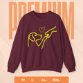 Maroon sweatshirt with yellow graphic of a hand and dog, on a peach background with 'PREMIUM' text.
