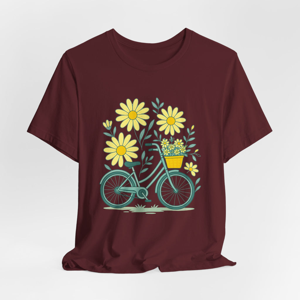 Marroon t-shirt with a bicycle and flower design on a white background