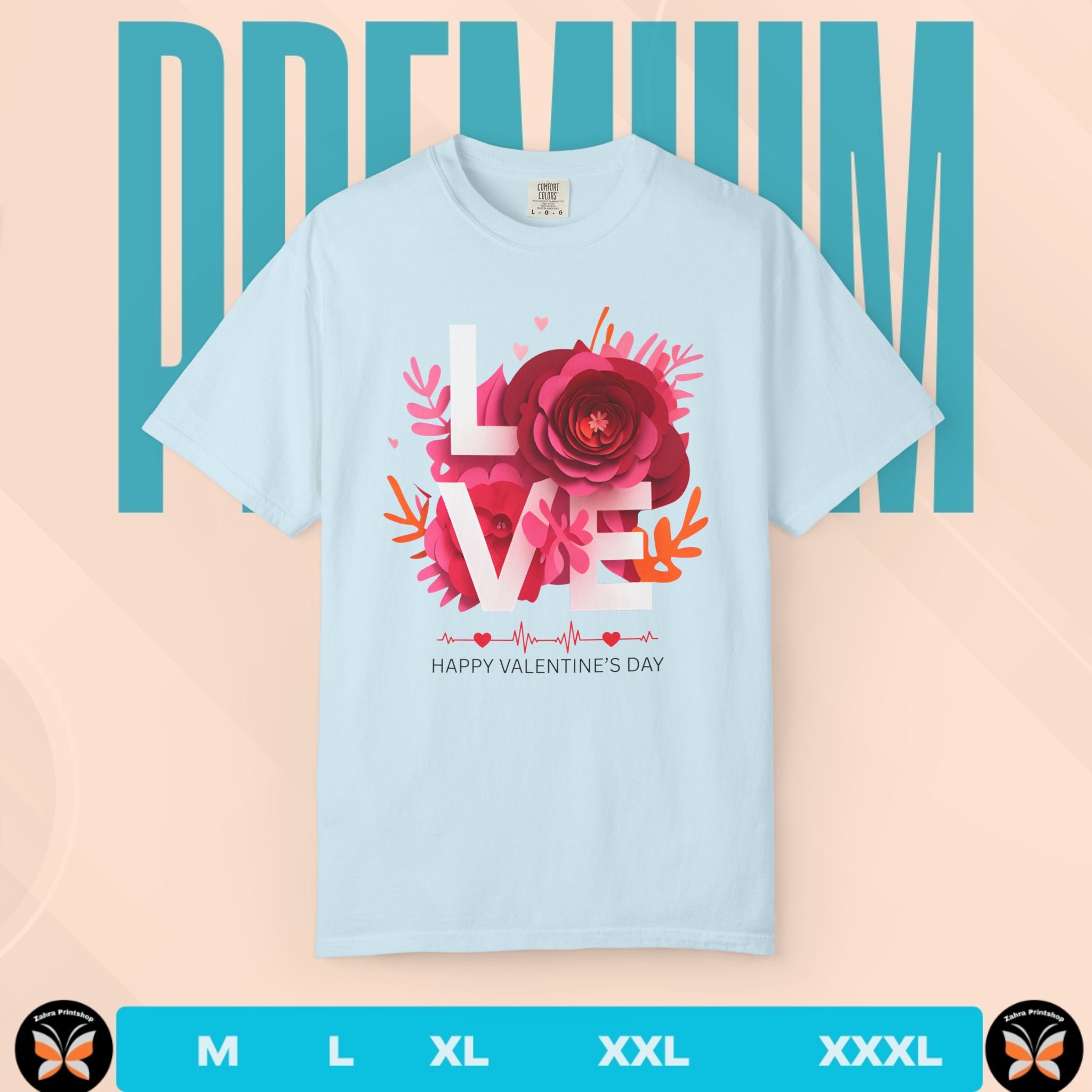 Light blue t-shirt with Valentine's Day design featuring flowers and text on a peach background.