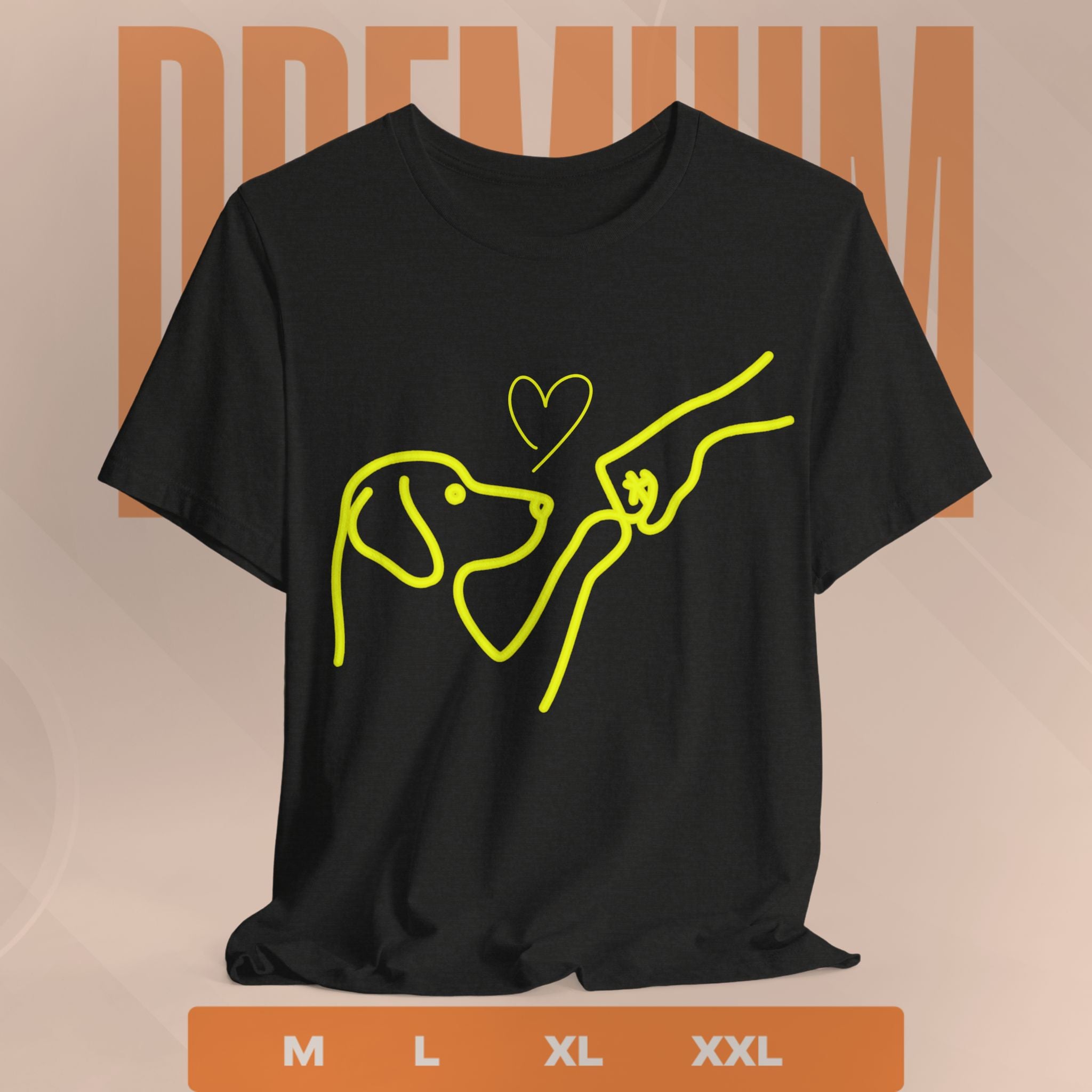Black t-shirt with yellow line art of a dog and hand holding a heart on a beige background.