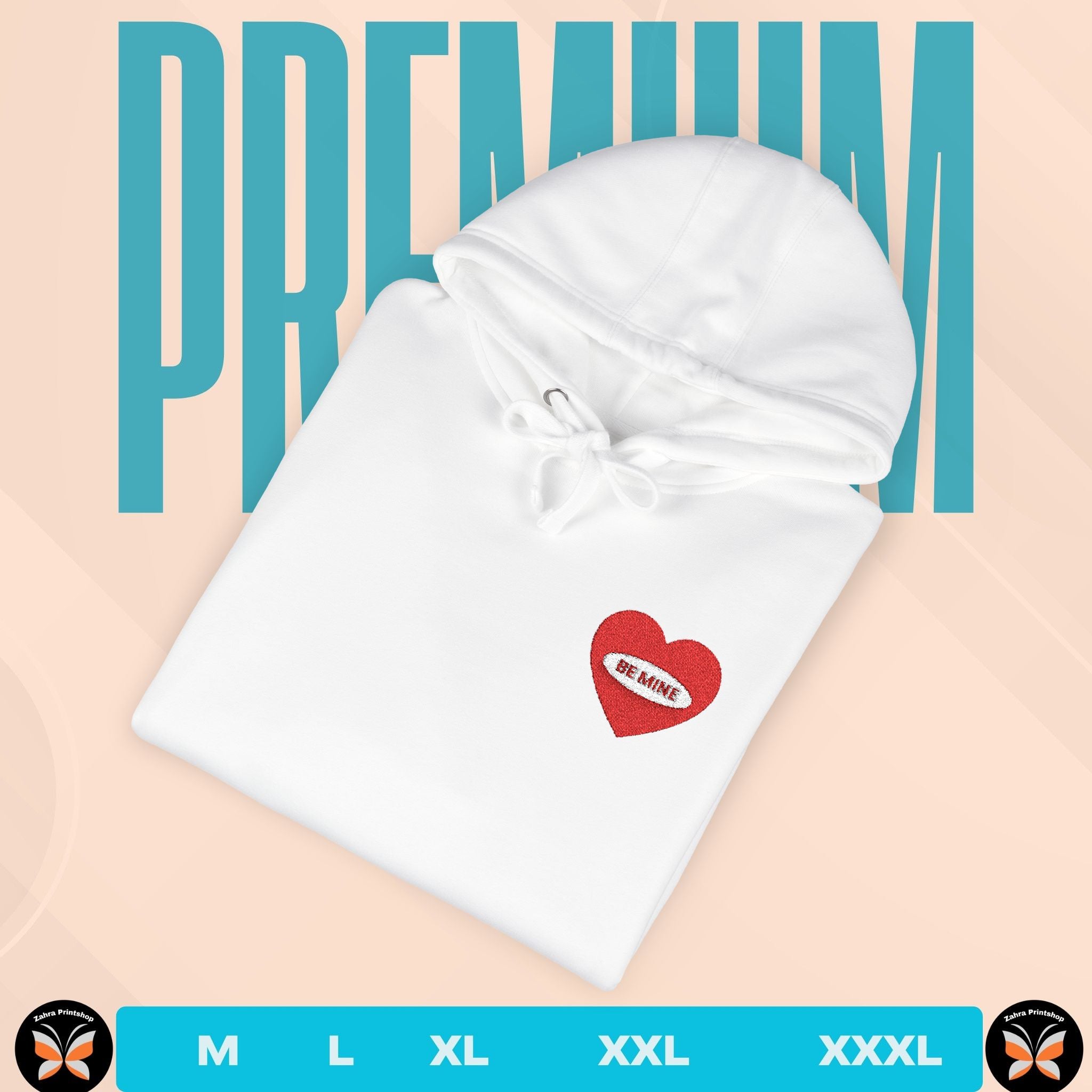 White hoodie with a red heart logo on a peach background with 'PREMIUM' text.
