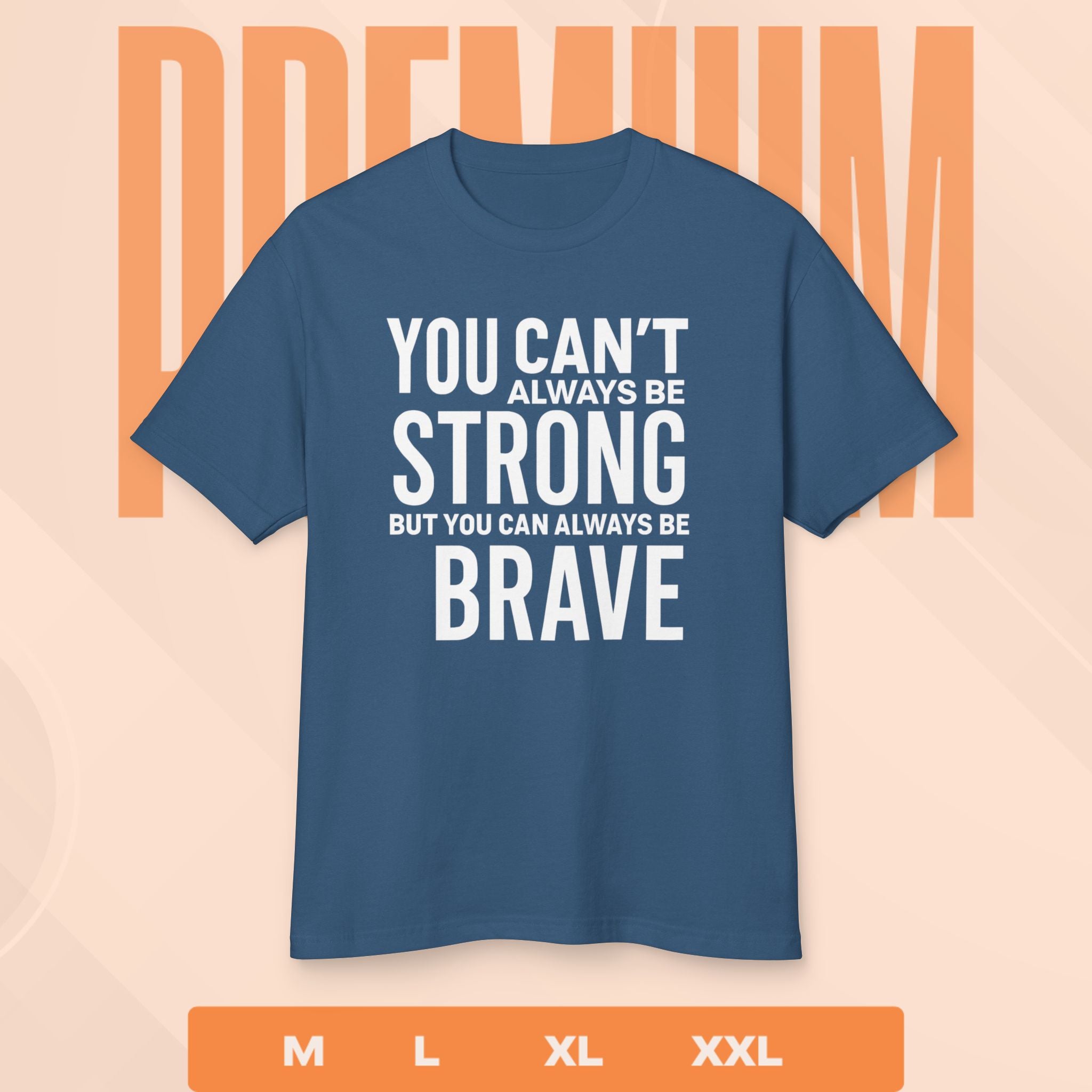 Blue t-shirt with motivational quote on a peach background
