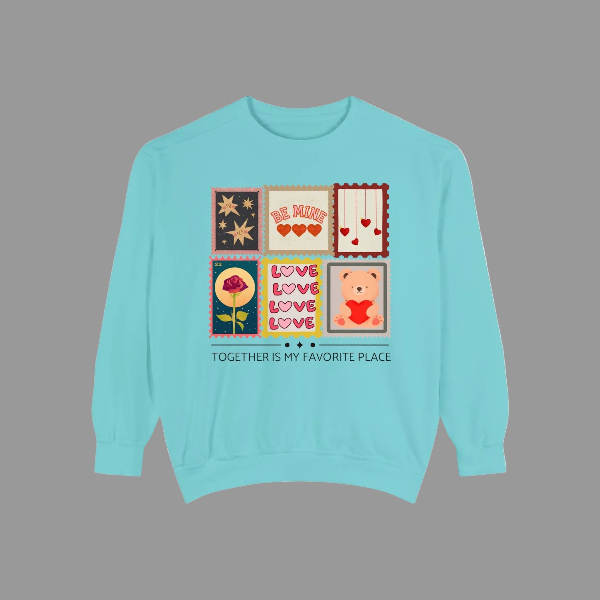 chalky mint sweatshirt with graphic designs and text on a white background