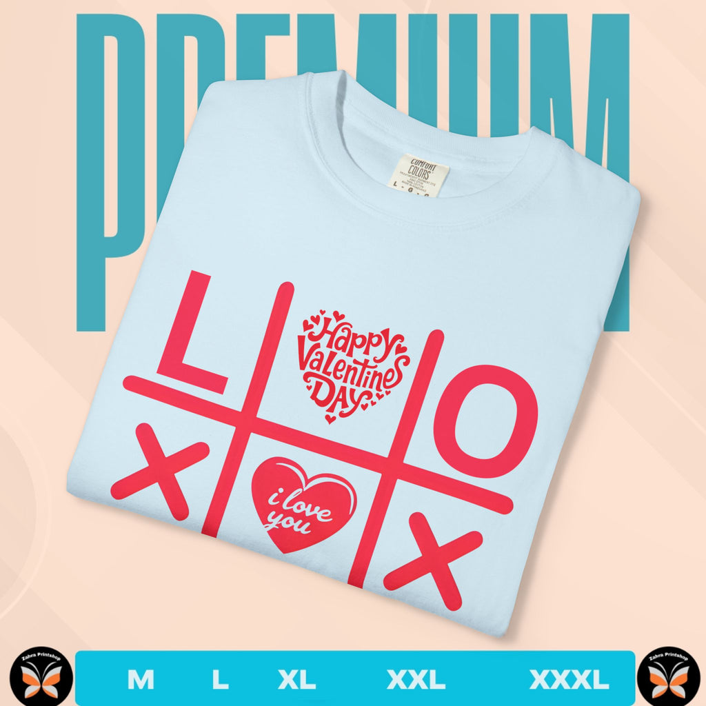 Light blue t-shirt with red Valentine's Day design on a beige background