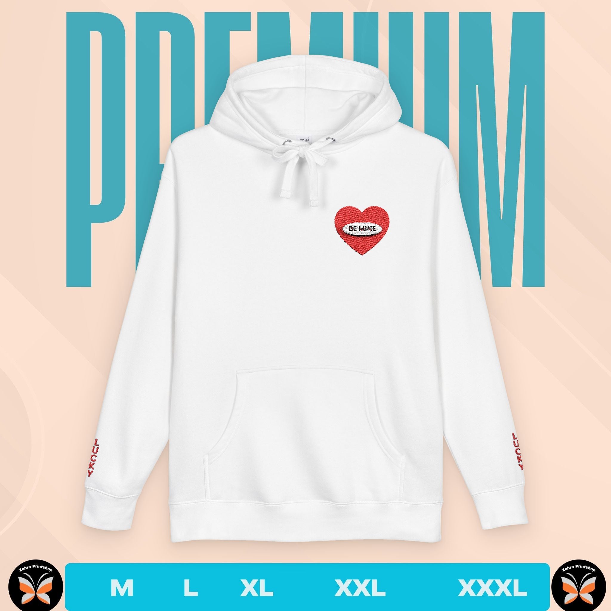 White hoodie with a red heart design on a peach background with 'PREMIUM' text.