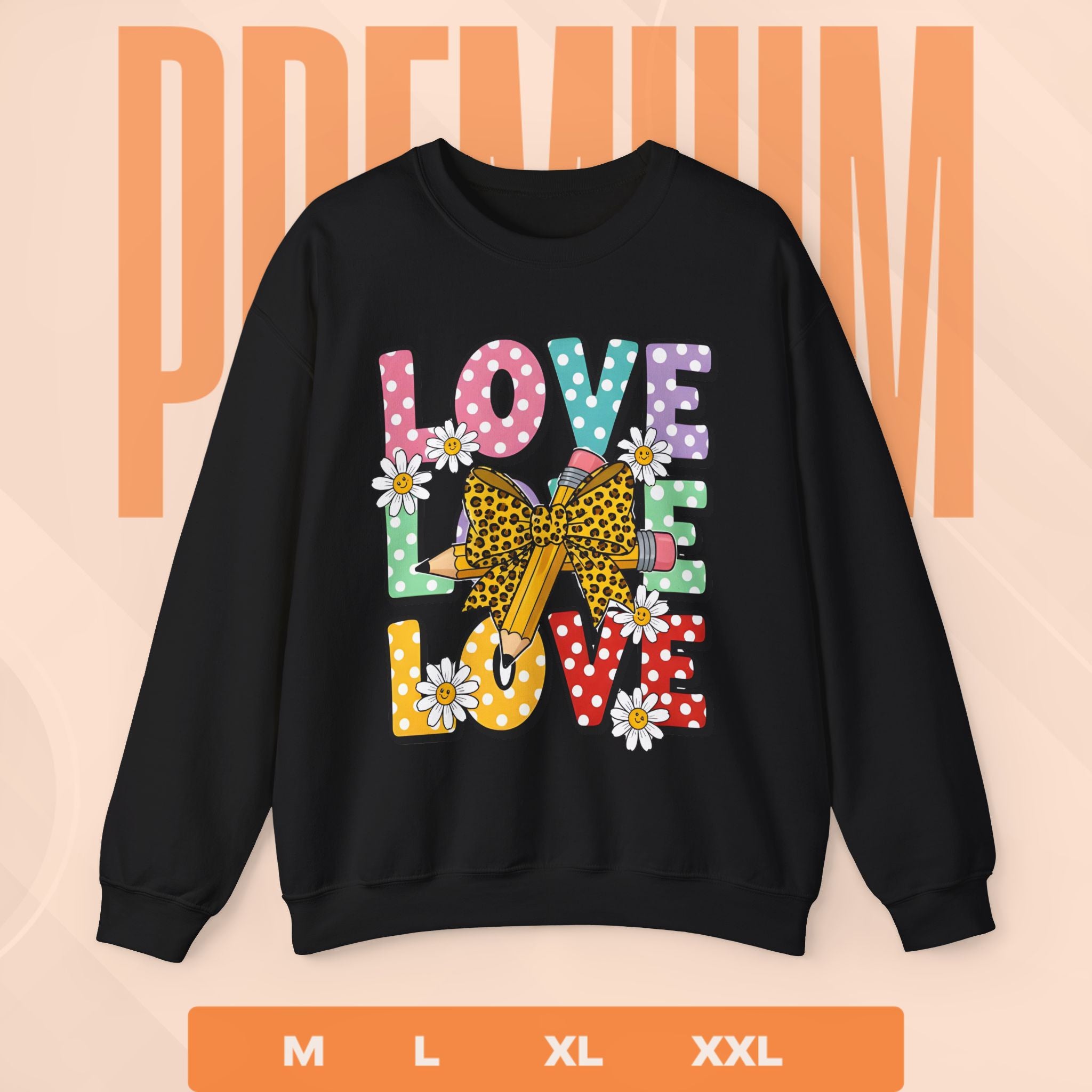 Black sweatshirt with colorful 'LOVE' graphic on a peach background