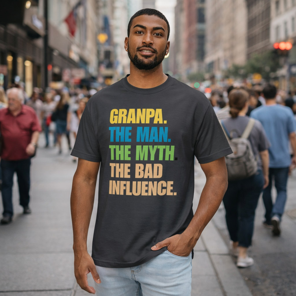 Man wearing a t-shirt with colorful text on a city street