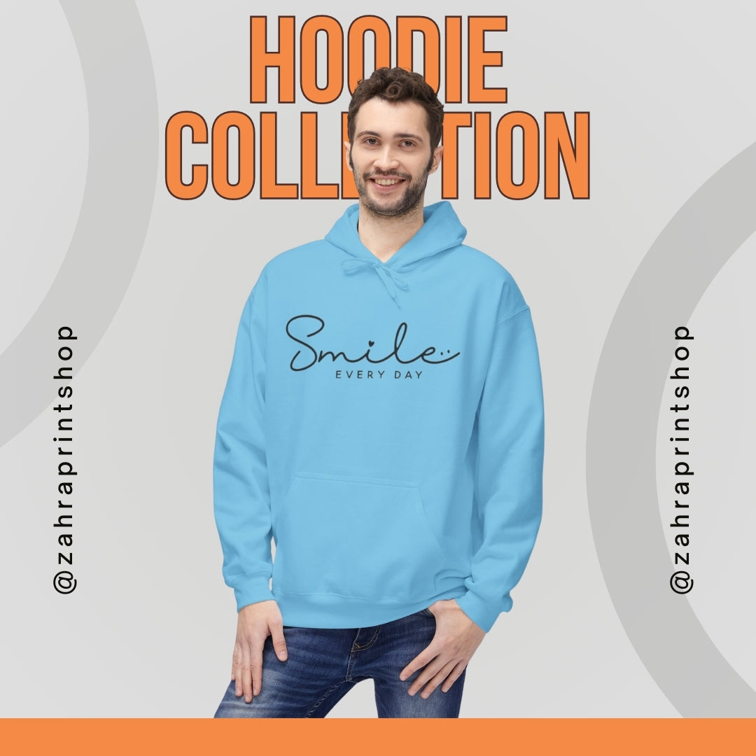 Man wearing a light blue hoodie with 'Smile Every Day' text, against a gray background with 'Hoodie Collection' text.