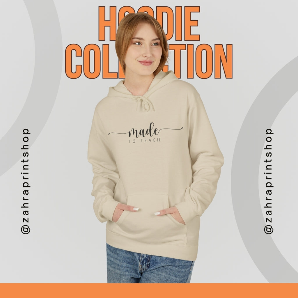 woman wearing a beige hoodie with 'made to teach' text, standing against a promotional background for a hoodie collection.